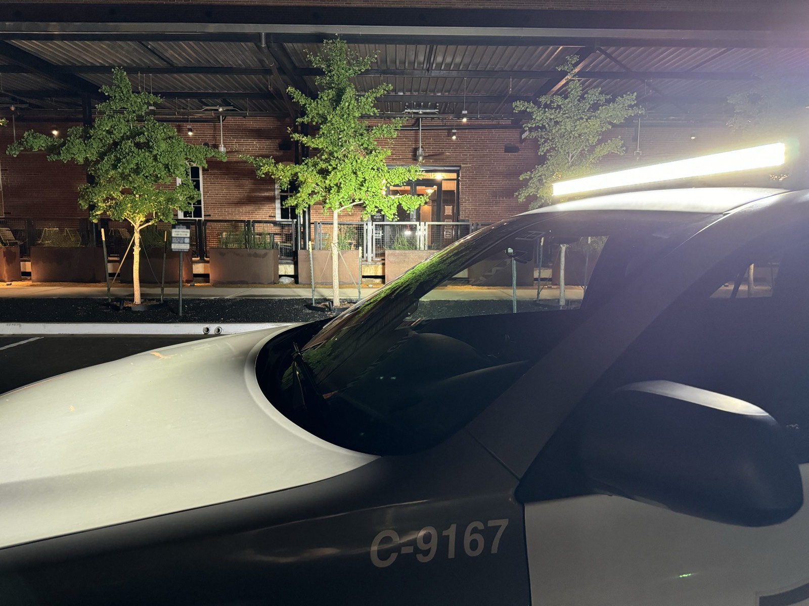 ISG patrol vehicle checking a property at night